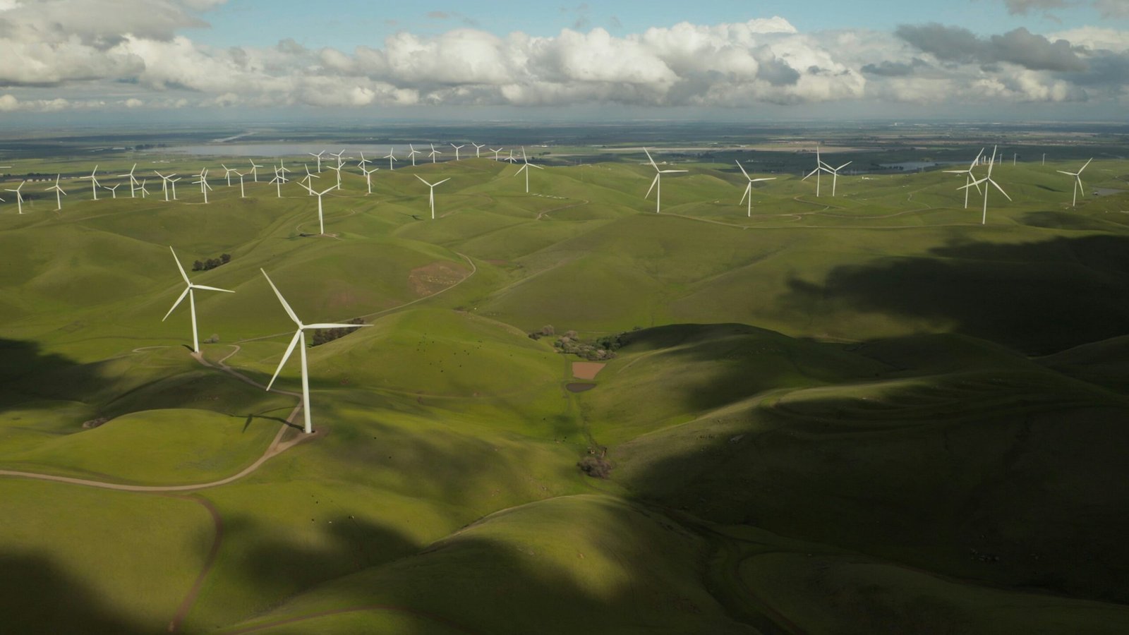 white windmill during daytime AJK Jobs 2025
